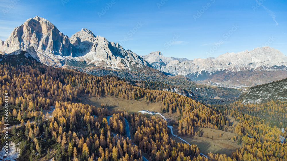 Curvy road at Passo Giau in the italian dolomites near Cortina d'Ampezzo during autumn season