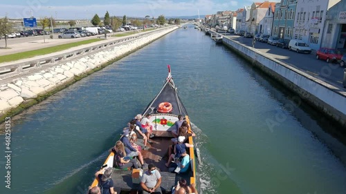 Moliceiro boat on canal of Ris de Aveiro photo