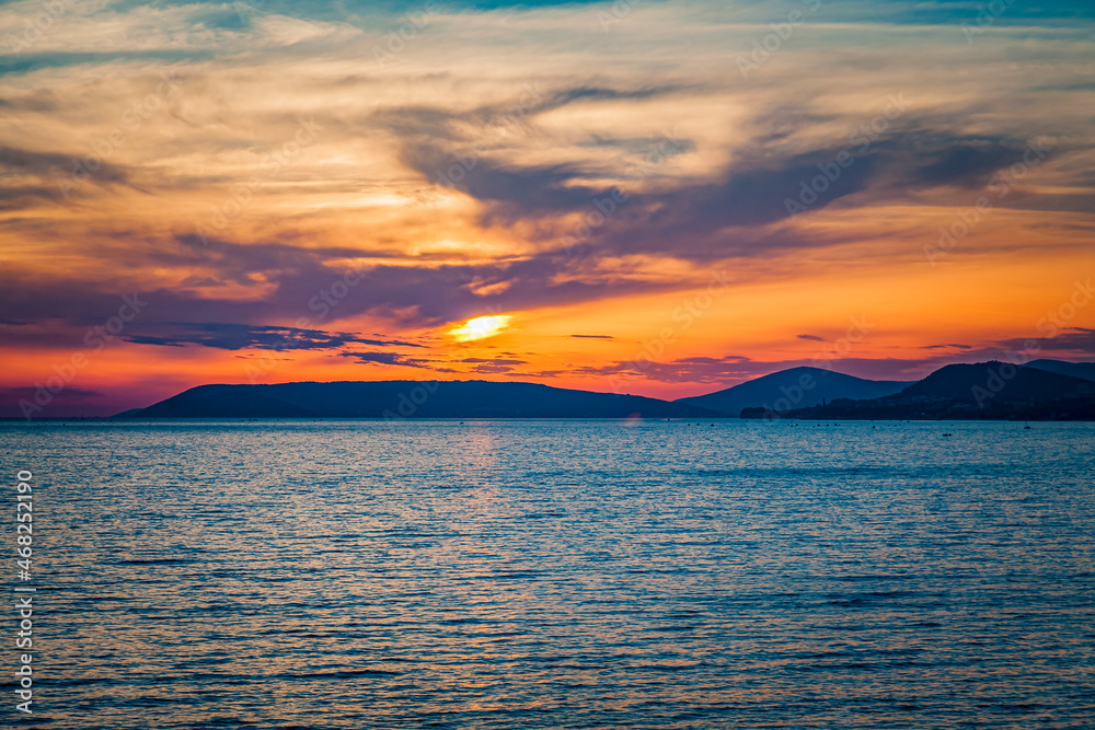Dramatic sunset from the coastal town of Trogir, Croatia looking out over the Adriatic
