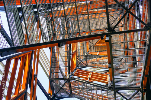 Fotografie a fragment of the structure of a new modern metal observation tower with decorat