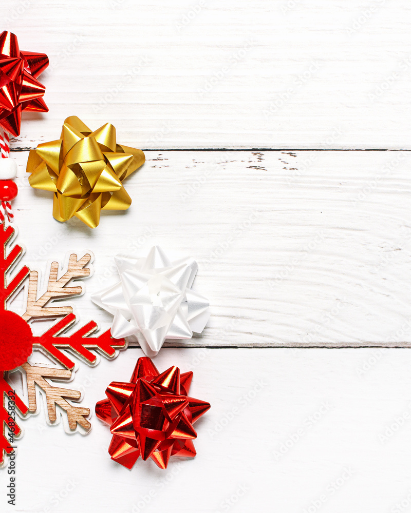 Creative composition made of Christmas decoration as tree on White wooden background with copy space. Top view, flat lay. New Year minimal concept. Creative composition made of Christmas decoration as tree on White wooden background with copy space. Top view, flat lay. New Year minimal concept.