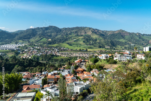 Panoramic and urban landscape of the city of Manizales and blue sky. Manizales, Caldas, Colombia. © camaralucida1