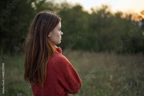 woman outdoors in a field walk fresh air