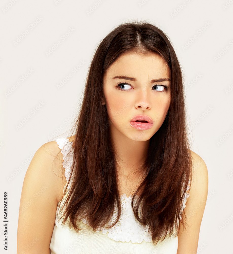 Fototapeta premium Doubt.Young woman thinking.