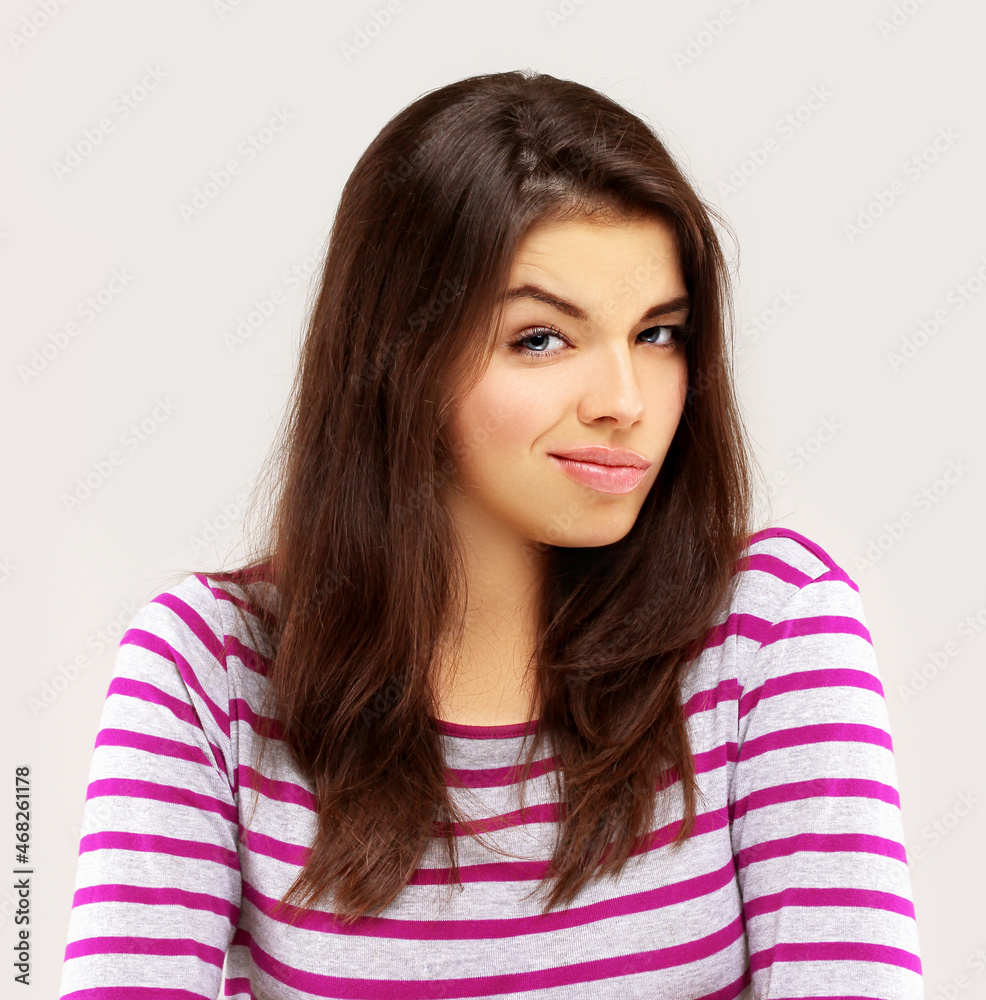 Portrait of disappointed girl looking at the camera. Portrait of disappointed girl looking at the camera.