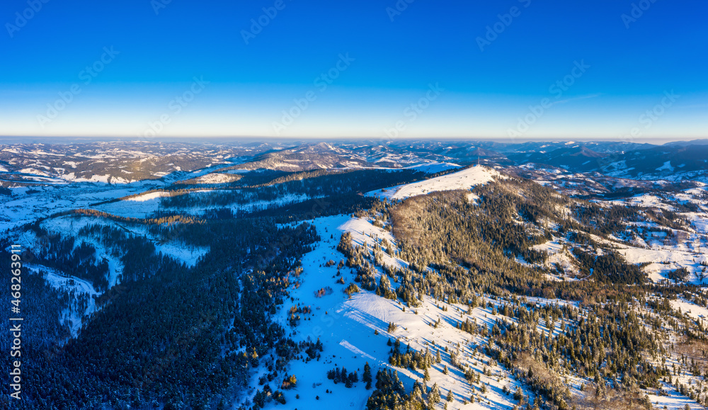 Naklejka premium Wonderful landscapes of the Carpathian mountains covered with the first snow in Ukraine near the village of Pylypets
