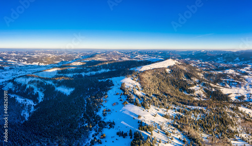 Wonderful landscapes of the Carpathian mountains covered with the first snow in Ukraine near the village of Pylypets