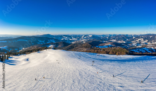 Magical winter panorama of beautiful snowy slopes © YouraPechkin