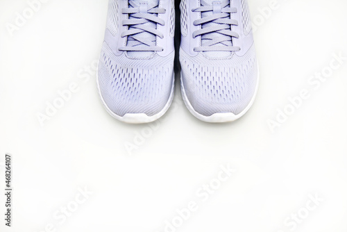 New unbranded running shoes, sneakers or trainers on white, top view