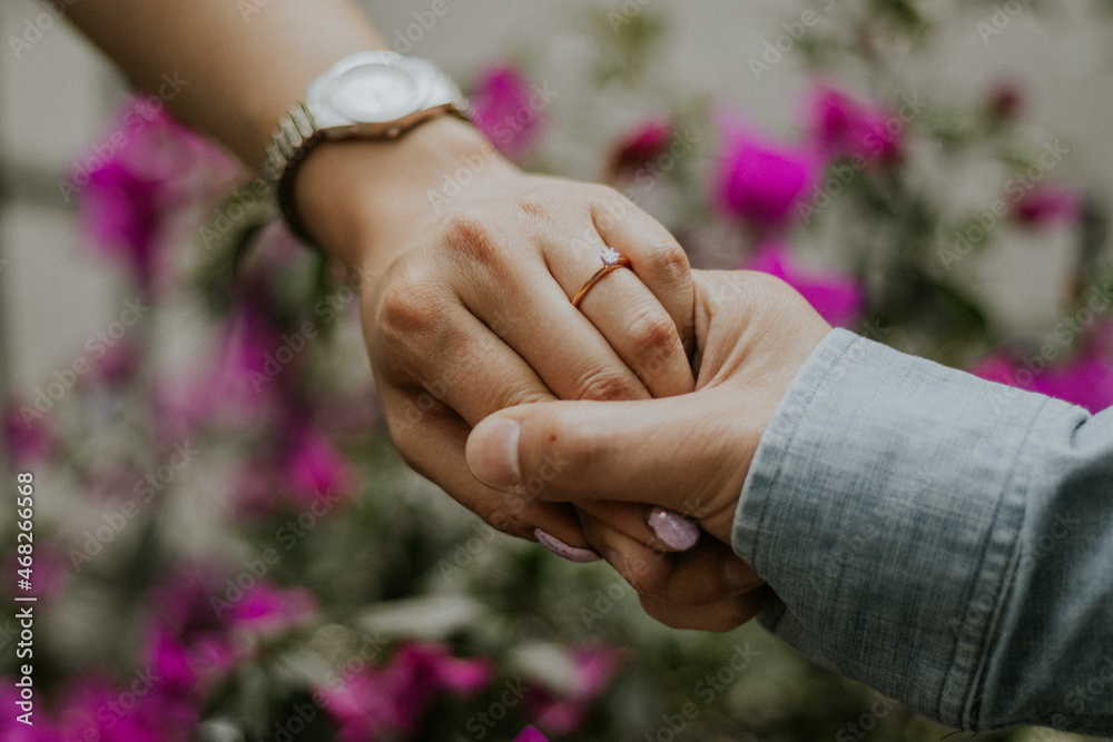 Fototapeta premium bride and groom holding hands