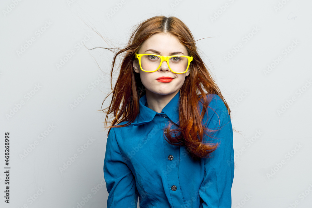 woman in blue shirt yellow glasses charm glamor woman in blue shirt yellow glasses charm glamor
