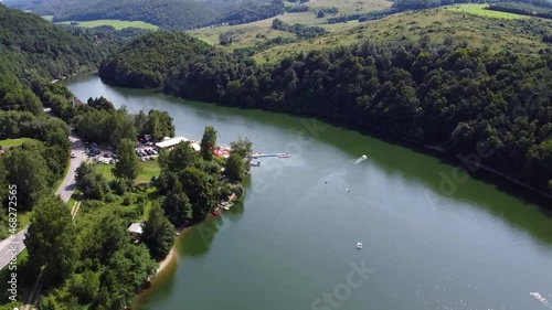 View of the Ruzin reservoir on the outskirts of Kosice. River and trees on the mountains. Drone Video. Slovakia. Europe	 photo