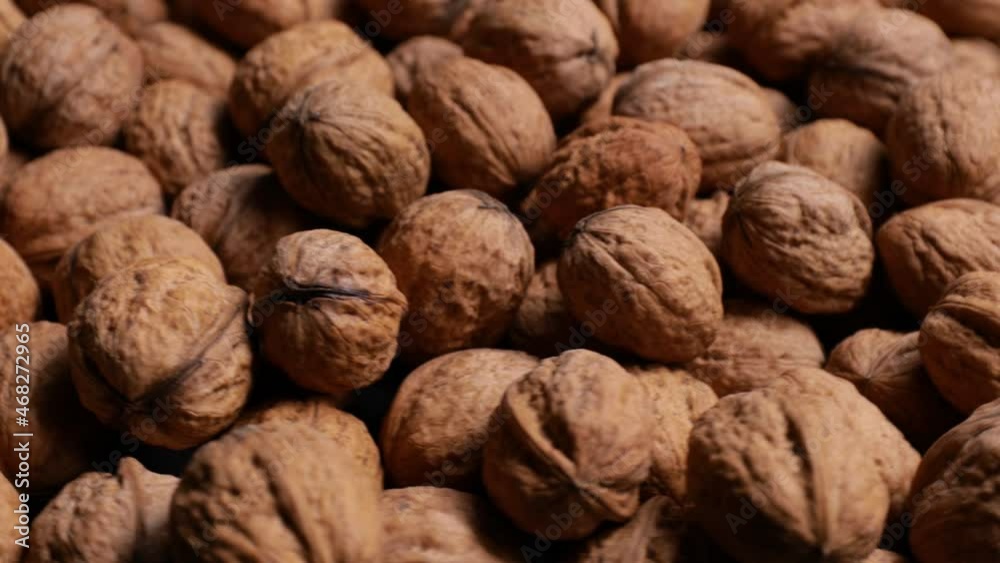 heap of walnuts in shells (looping) heap of walnuts in shells (looping)