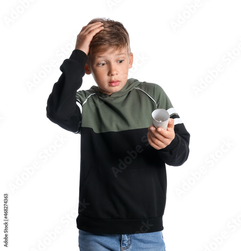 Shocked little boy with tub...