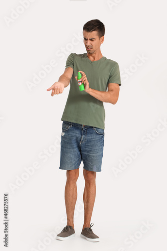 Young man with mosquito rep...