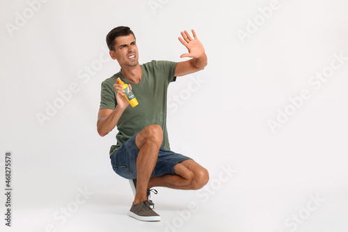 Young man with mosquito rep...