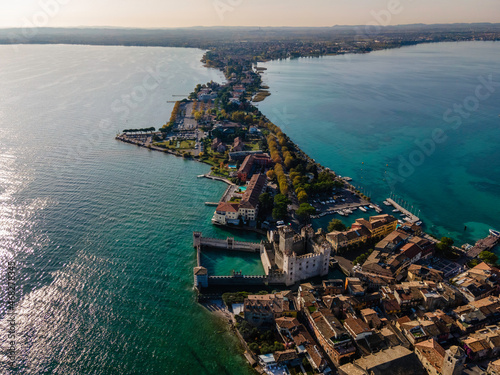 Aerial view of Castello Scaligero (Scaligero Castle), an ancient fortress along Sirmione coastal, Lombardy, italy.