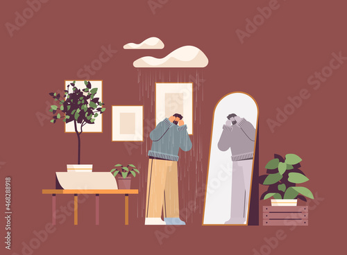 unhappy depressed man under rain cloud looking at mirror guy feeling desperate mental health diseases depression stress