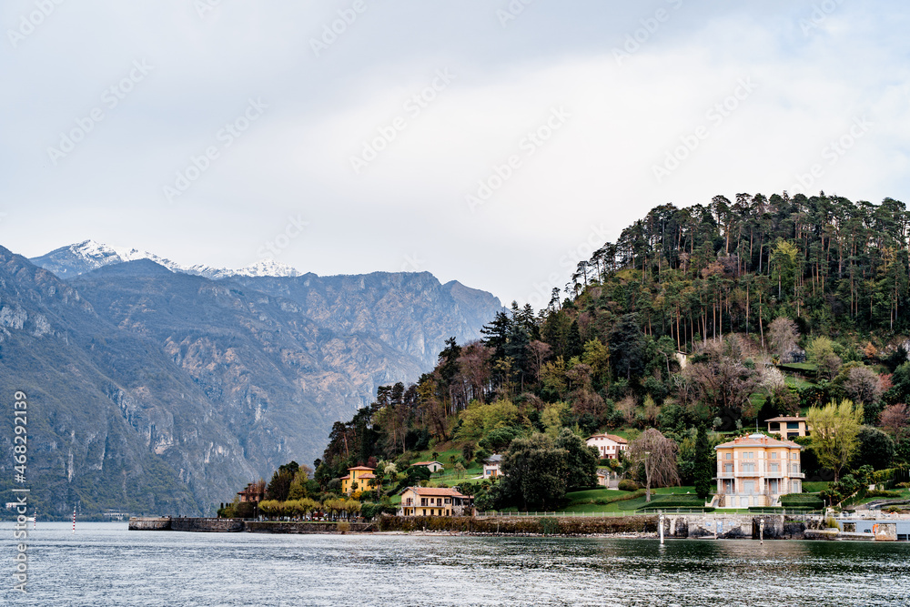 Old villas against the backdrop of the mountains. Lake Como
