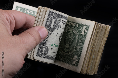 Bundle of tattered 1 American dollar bills