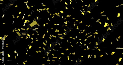 Digital image of gold confetti falling against a black background photo