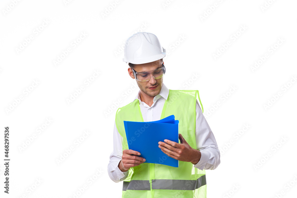 engineer in working uniform protective clothing documents construction