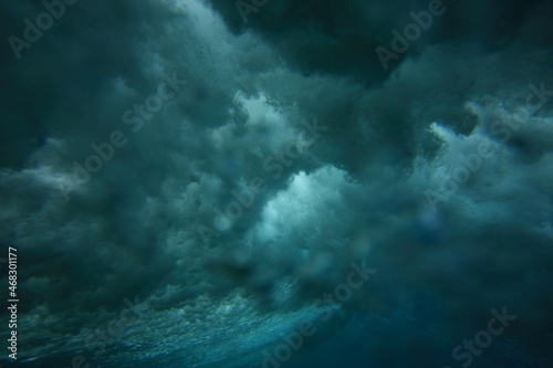wave breaking viewed from underwater