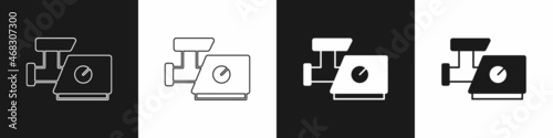 Set Kitchen meat grinder icon isolated on black and white background. Vector