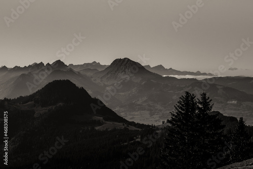 Landscape panoramic view of the swiss Alps  shot on the Mol  son mountain Fribourg  Switzerland