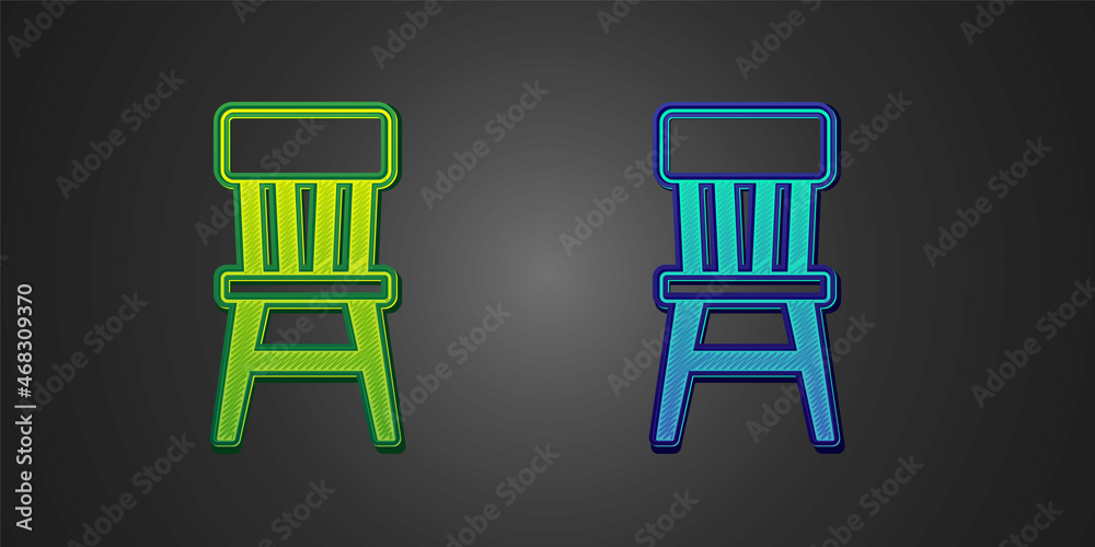 Green and blue Chair icon isolated on black background. Vector