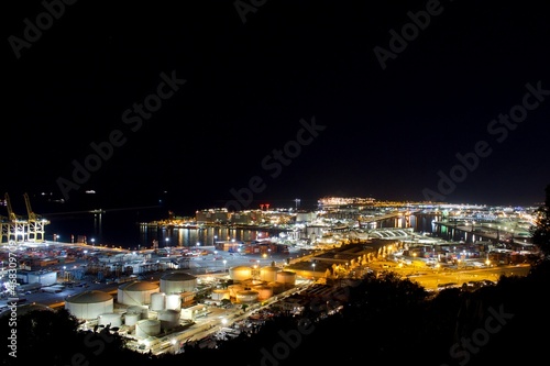 Industrial area of the port of Barcelona at night. View from Montjuic mountain.