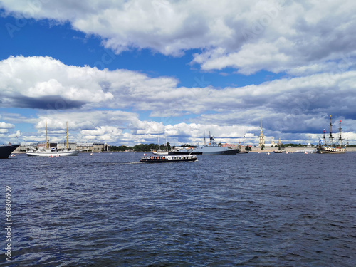 Warships, frigates and sailboats built in the Neva water area for the Day of the Navy in St. Petersburg. © Elena