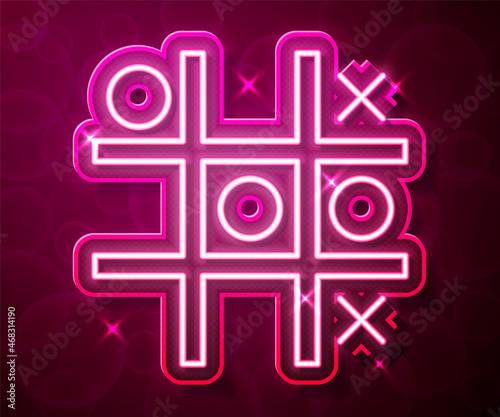 Glowing neon line Tic tac toe game icon isolated on red background. Vector