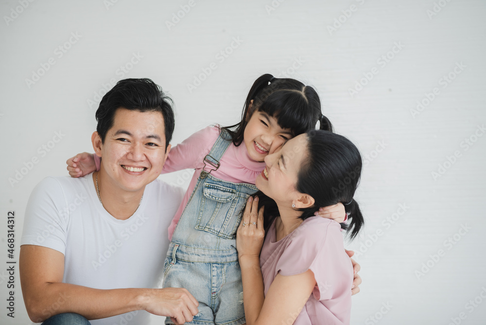daughter children with mother and father are happy at home family together, lifestyle of Asian young girl with smile face are fun in a house with mom and dad daughter children with mother and father are happy at home family together, lifestyle of Asian young girl with smile face are fun in a house with mom and dad