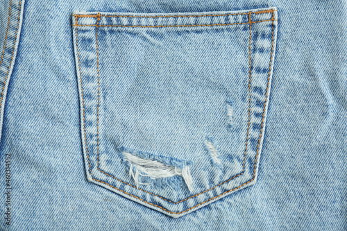 Stylish light blue jeans, closeup of back pocket