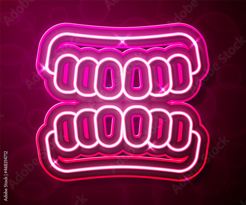 Glowing neon line Dentures model icon isolated on red background. Teeth of the upper jaw. Dental concept. Vector