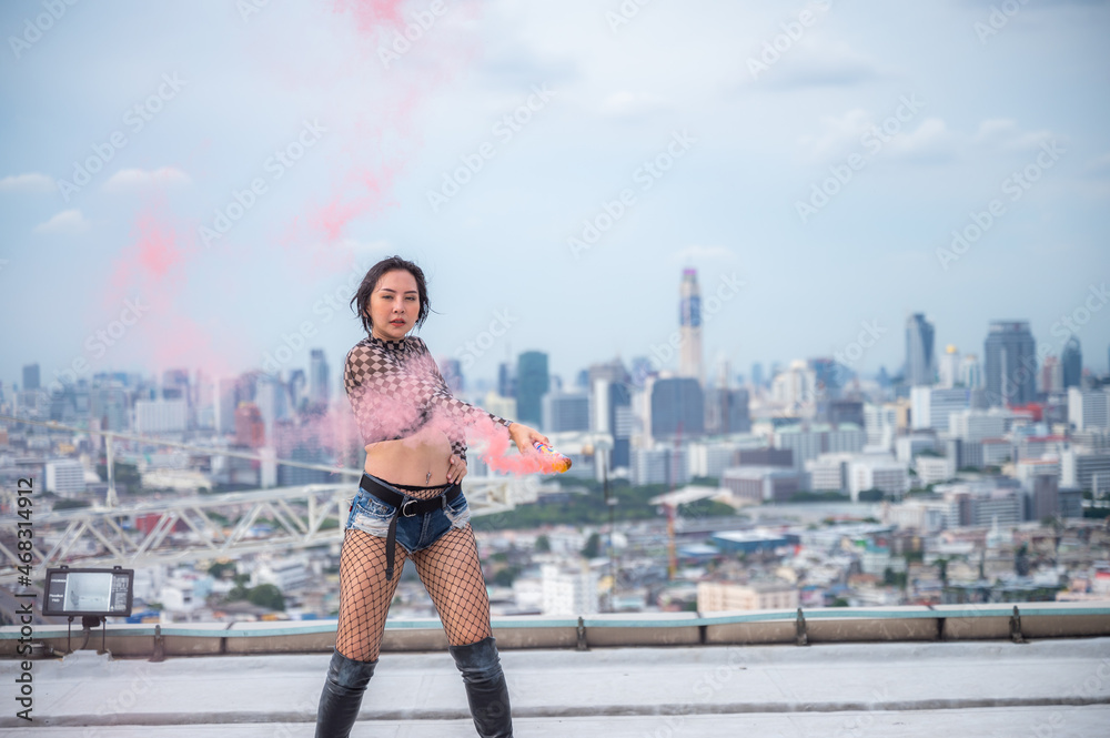 Asian woman person are dancing outdoor, sexy dancer girl female at studio performance Asian woman person are dancing outdoor, sexy dancer girl female at studio performance