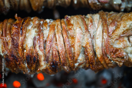 Kokorech, lamb intestines and giblets are cooked on spit.