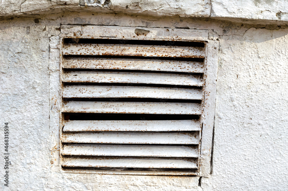 metal grilles of old ventilation, painted with white paint metal grilles of old ventilation, painted with white paint
