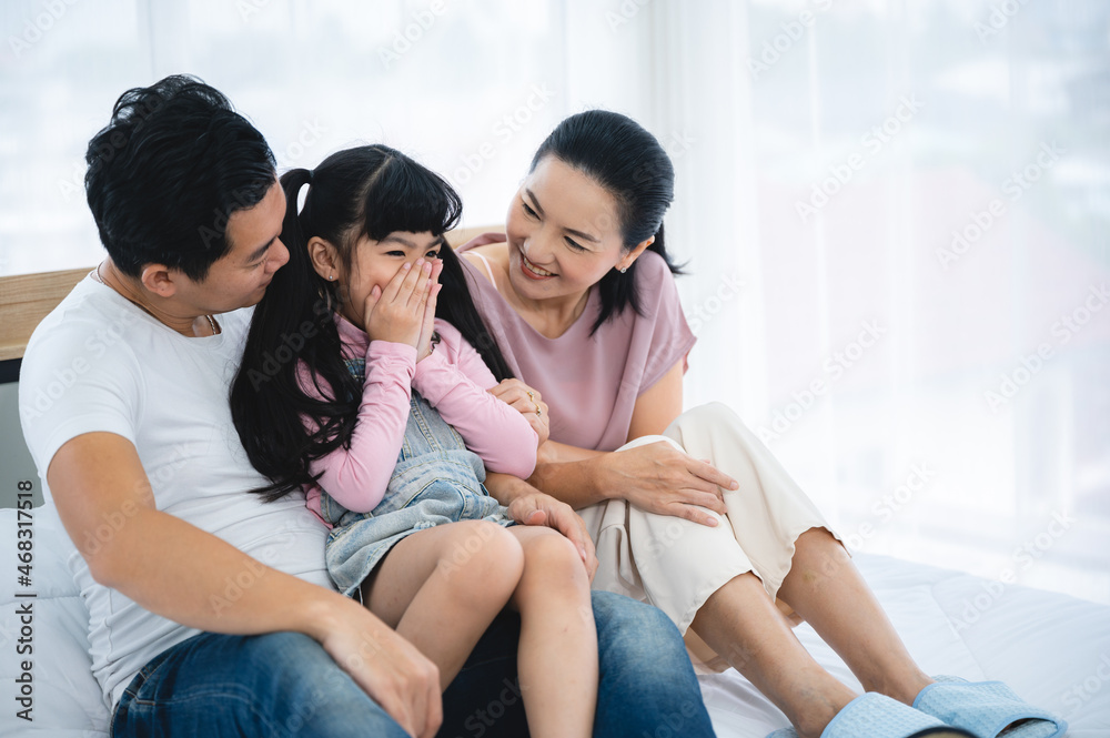 happy love family lifestyle with Asian father and mother and child daughter at home together happy love family lifestyle with Asian father and mother and child daughter at home together