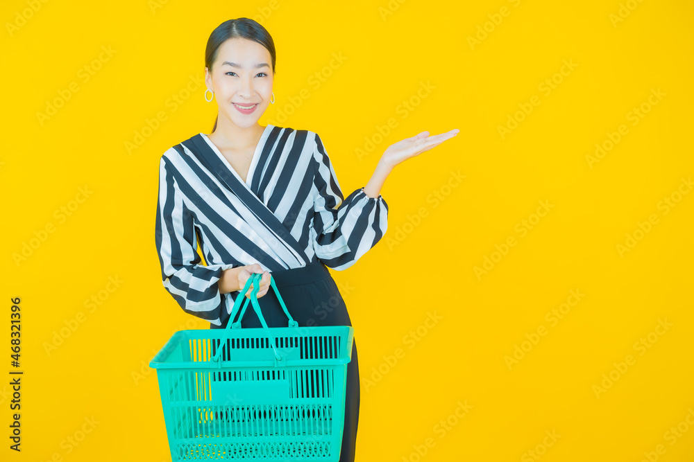 Portrait beautiful young asian woman smile with grocery basket Portrait beautiful young asian woman smile with grocery basket