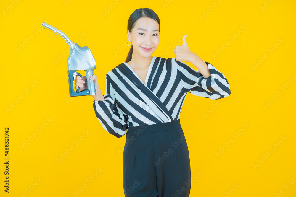 Portrait beautiful young asian woman feul gas pump Portrait beautiful young asian woman feul gas pump