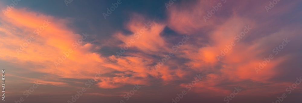 Fiery sunset, colorful clouds in the sky	