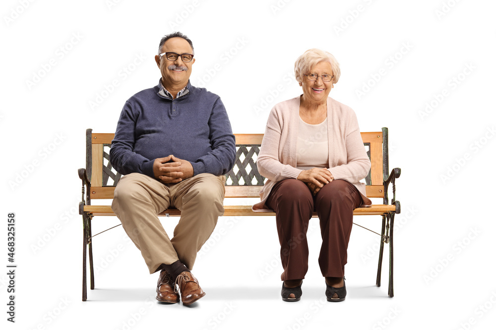 Elderly man and woman in casual clothes sitting on a bench