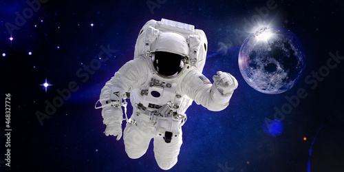 Astronaut in the space near the planet Earth, Spaceman. Elements of this image furnished by NASA 
