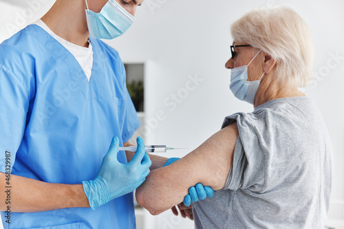 male doctor arm injection vaccine passport immunization safety