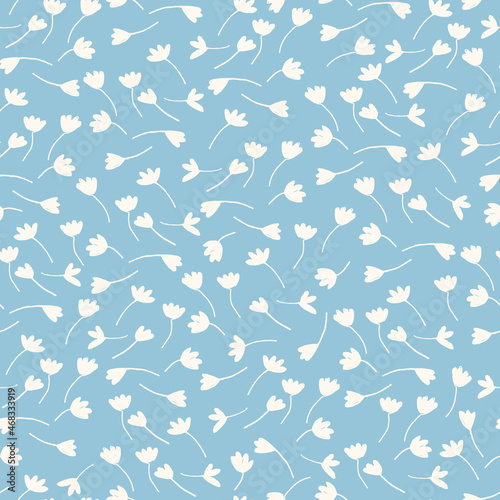 Seamless pattern with hand drawn meadow flowers in Ditzy style. Wildflowers illustrations on sky blue background for surface design and other design projects