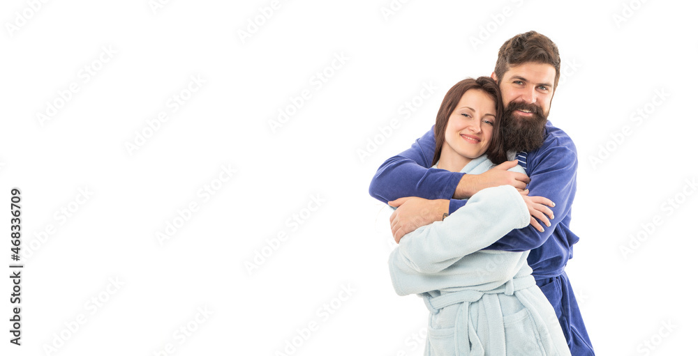 Family couple in robes of happy man hugging woman in morning isolated on white copy space, romance Family couple in robes of happy man hugging woman in morning isolated on white copy space, romance