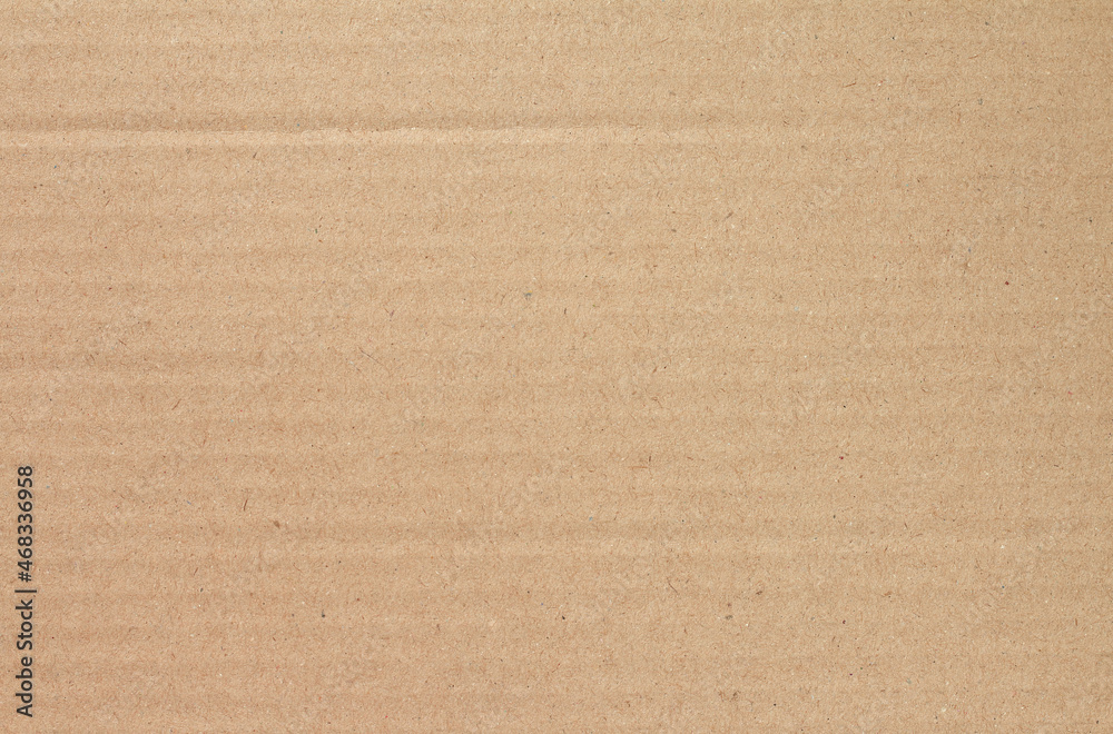 Cardboard sheet texture background, detail of recycle brown paper box pattern. Cardboard sheet texture background, detail of recycle brown paper box pattern.