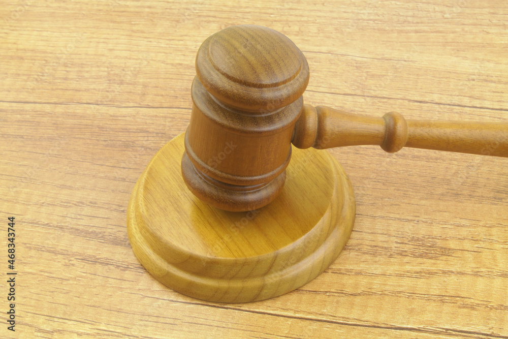 Gavel on wooden table, legal system and court